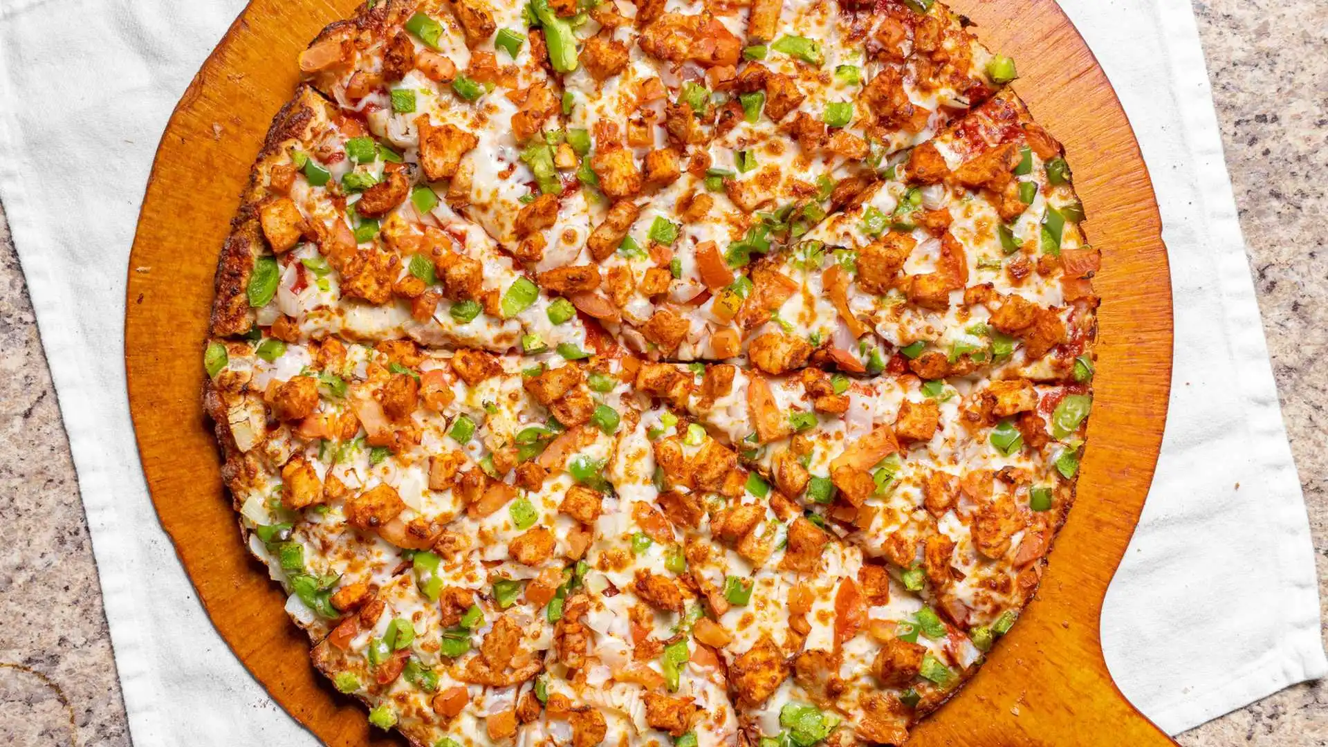 Pesto Paneer Pizza with fresh vegetables Pizza 64